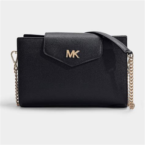 michael michael kors large crossbody clutch|Michael Kors studded clutch.